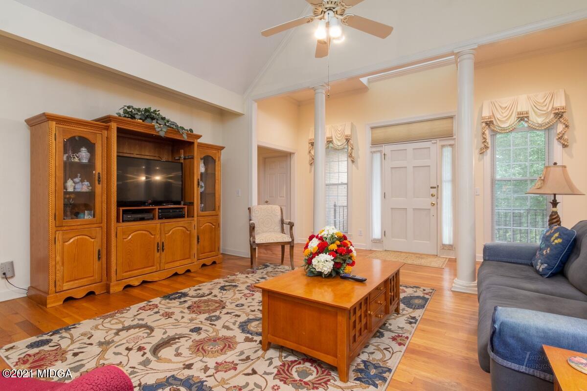 7471 Rivoli Road Macon, GA 31210 - Photo 9 of 26 a living room with furniture and a flat screen tv