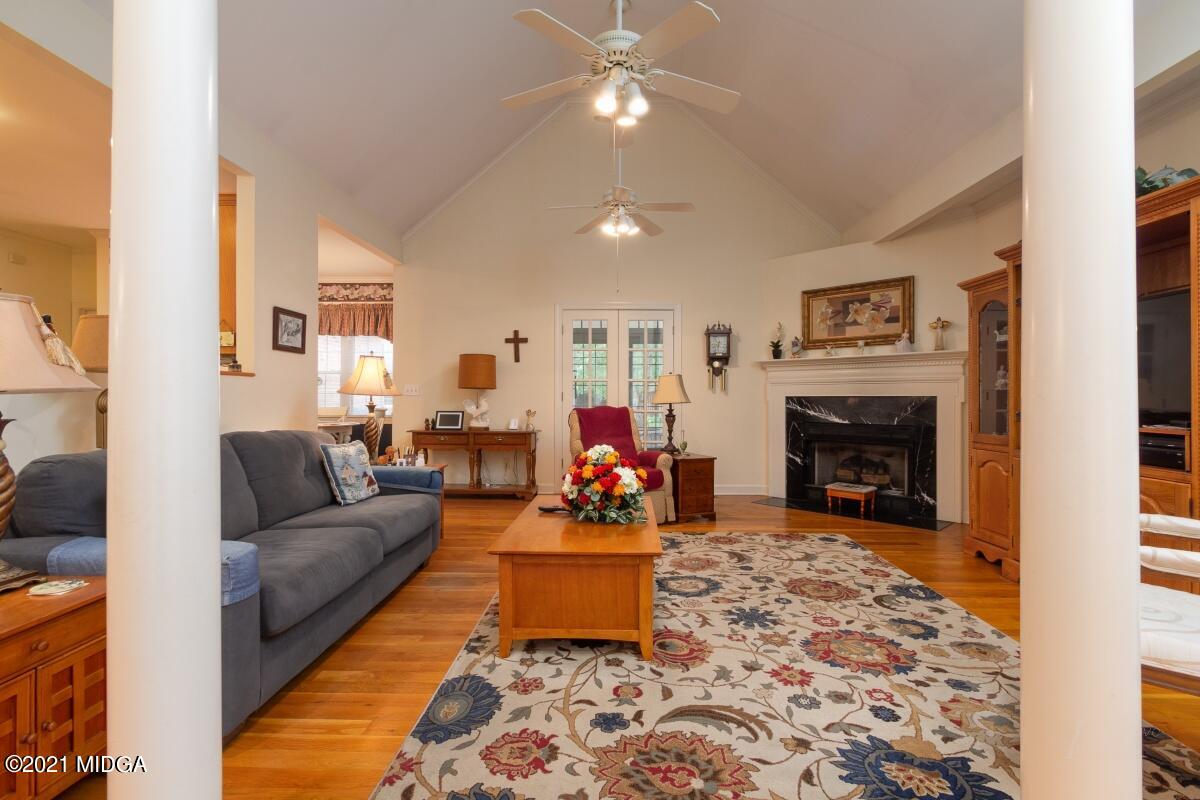 7471 Rivoli Road Macon, GA 31210 - Photo 10 of 26 a living room with furniture and a fireplace
