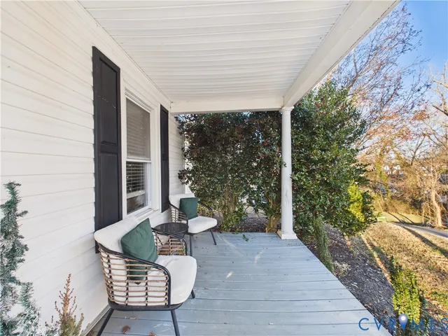 a porch with seating space