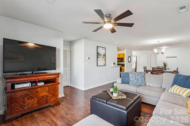 a bedroom with a bed and a tv