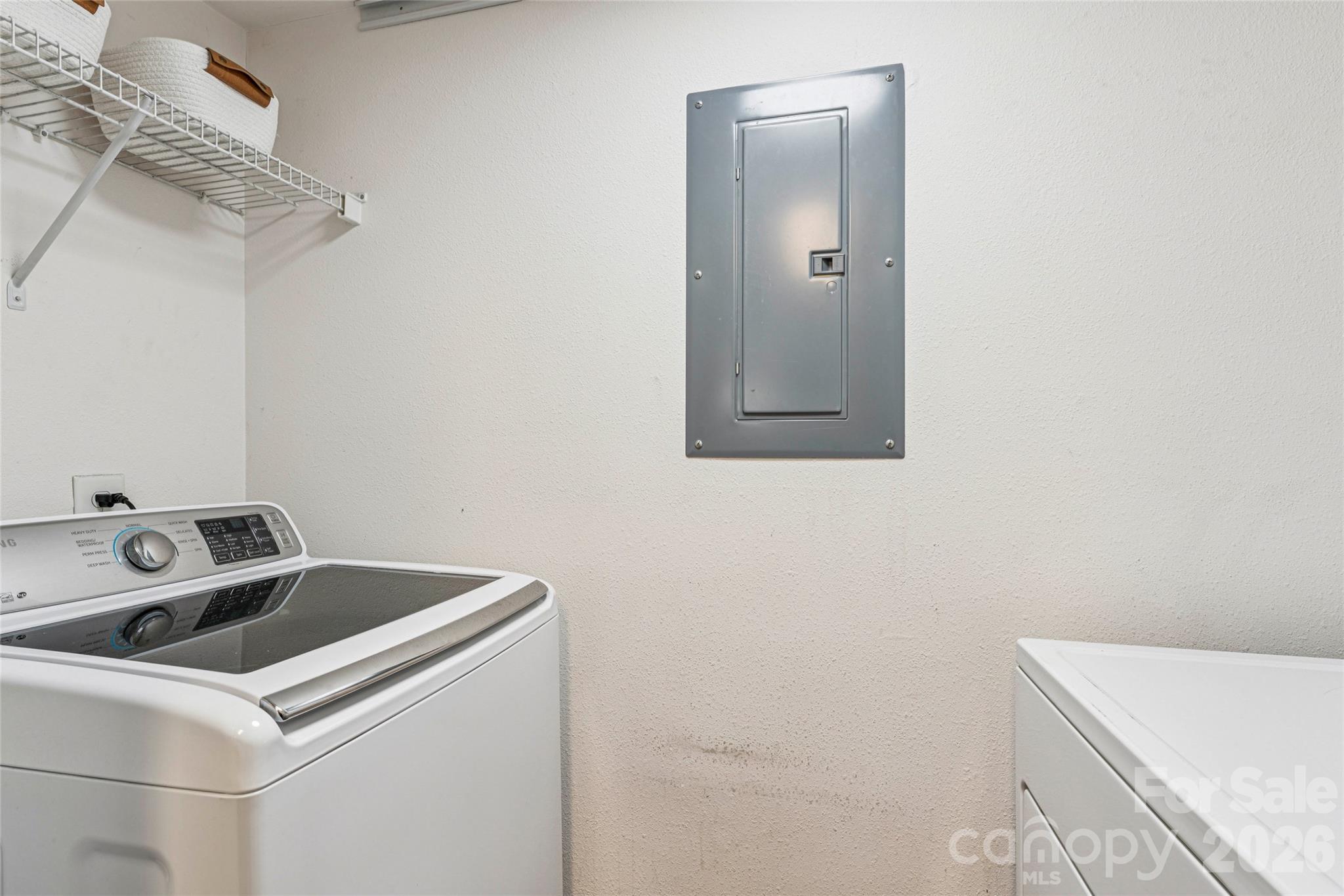 3956 Town Center Road Harrisburg, NC 28075 - Photo 18 of 47 a utility room with dryer and washer