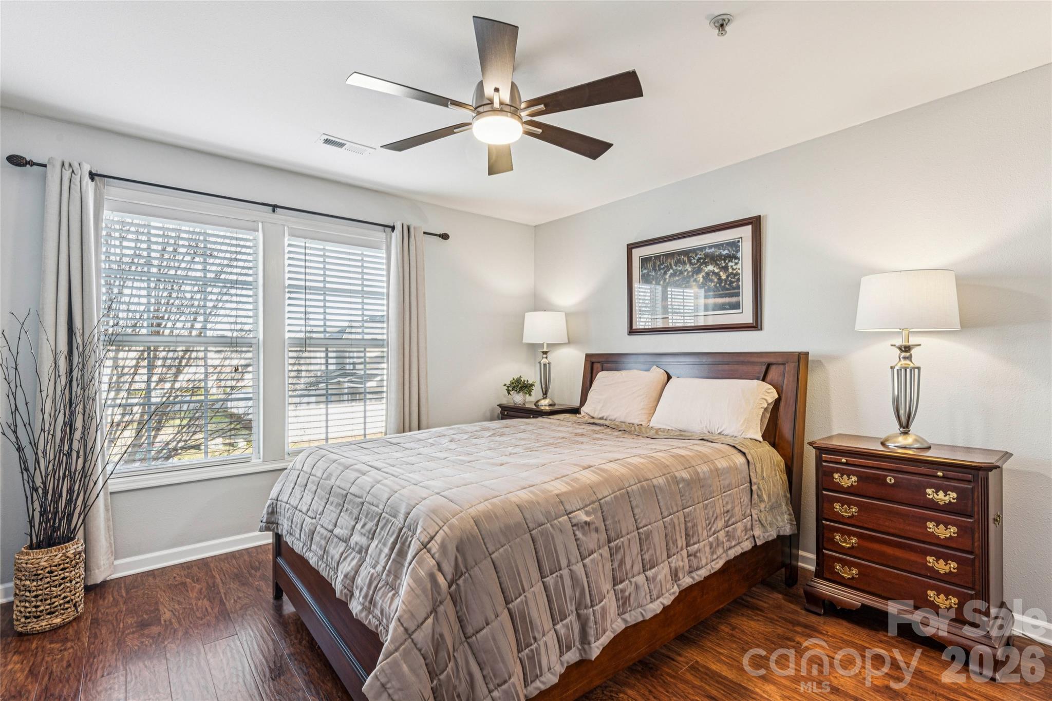 3956 Town Center Road Harrisburg, NC 28075 - Photo 21 of 47 a bedroom with a bed and a large window