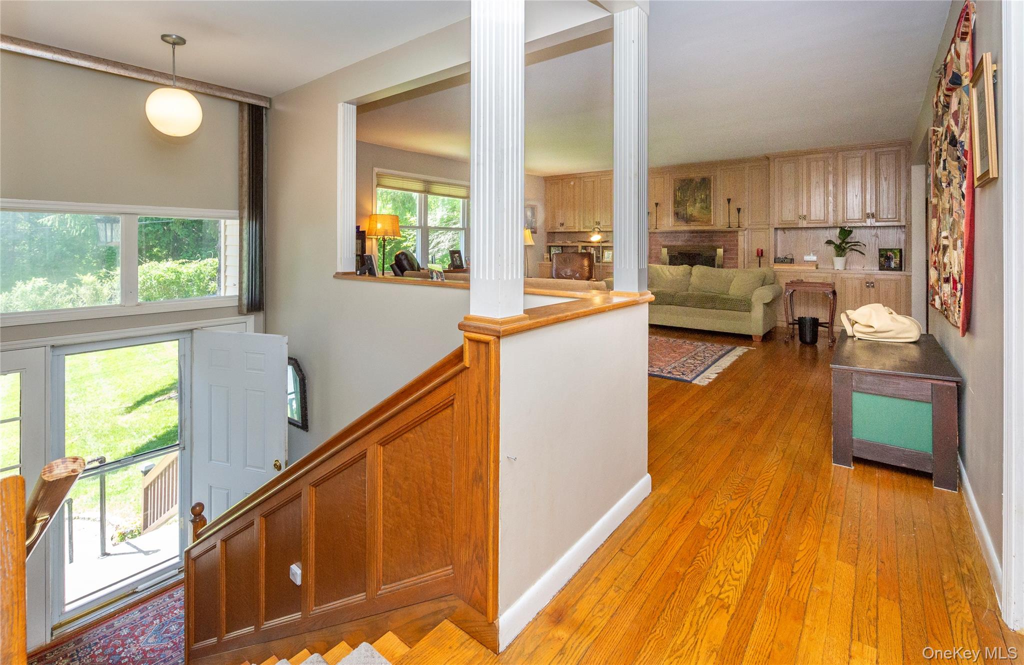 32 Cobb Road Brewster, NY 10509 - Photo 7 of 49 a view of a living room and kitchen with a large window