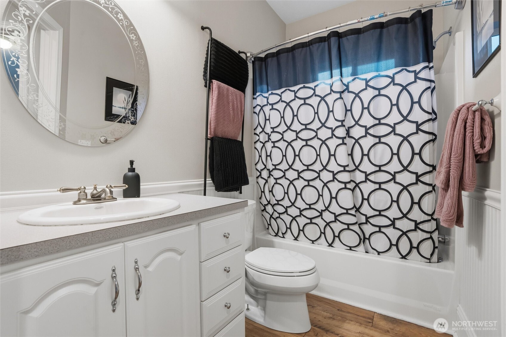 18680 Northwest Hintzville Road Seabeck, WA 98380 - Photo 12 of 40 a bathroom with a toilet a sink and mirror