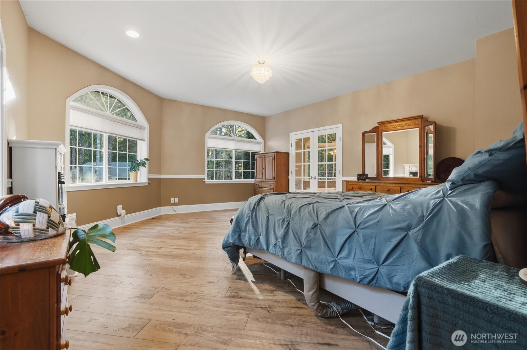 18680 Northwest Hintzville Road Seabeck, WA 98380 - Photo 19 of 40 a bedroom with bed and window