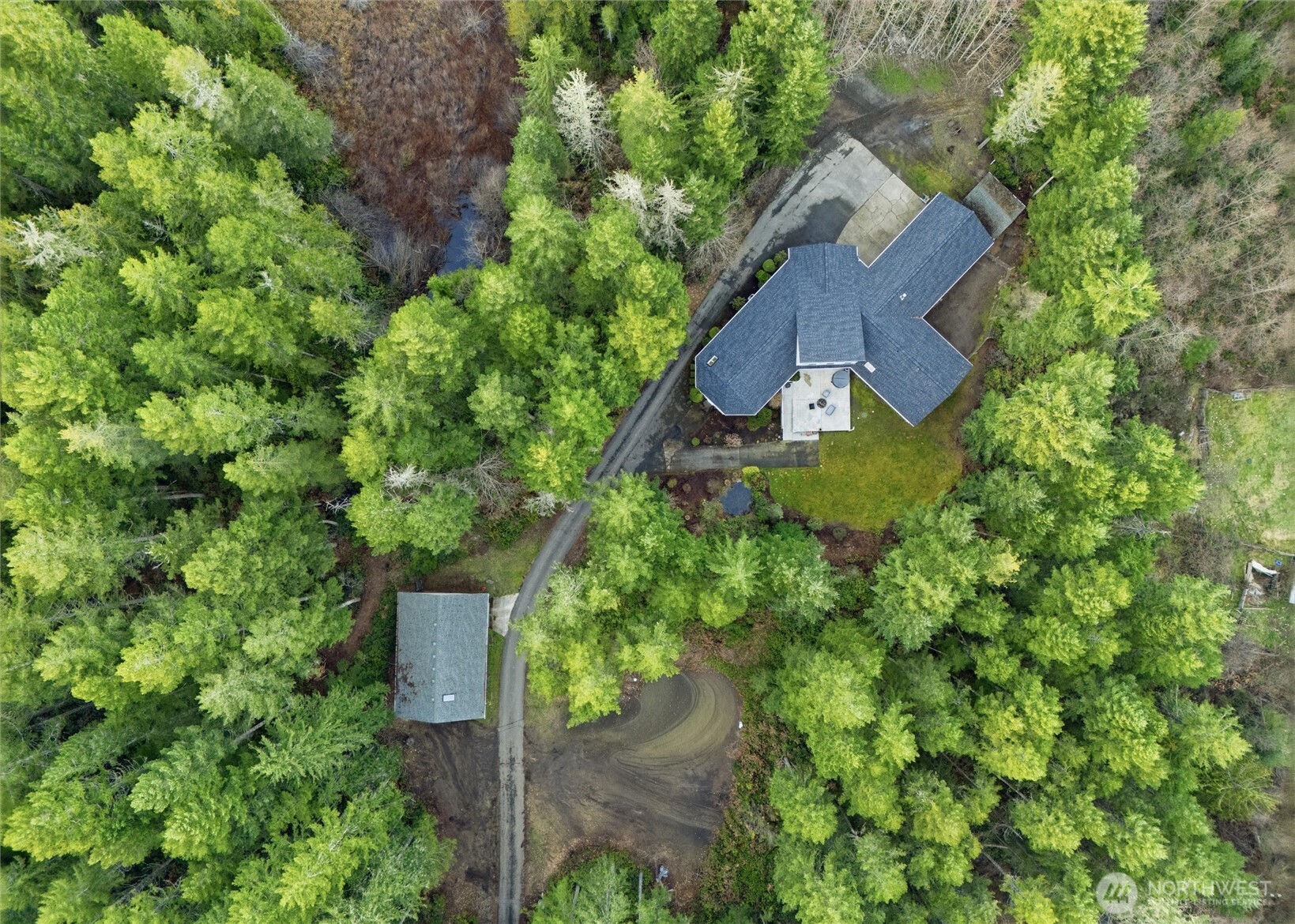 18680 Northwest Hintzville Road Seabeck, WA 98380 - Photo 39 of 40 an aerial view of a house
