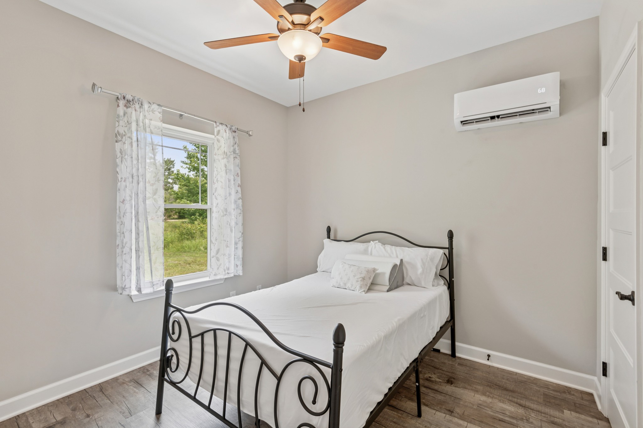 114 Eno Road Dickson, TN 37055 - Photo 13 of 25 a bedroom with a bed and a window