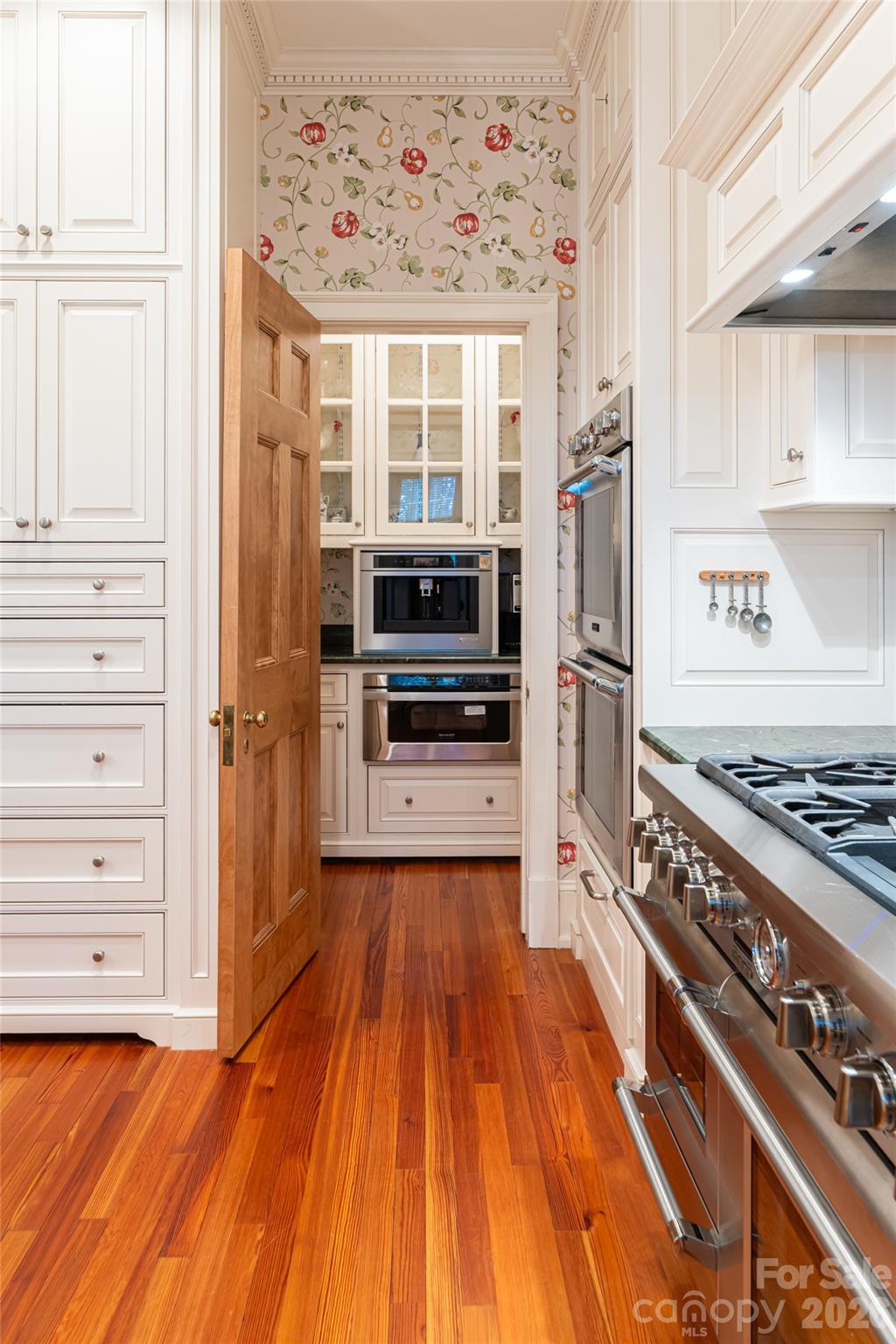 324 Vanderbilt Road Asheville, NC 28803 - Photo 19 of 48 a kitchen with stainless steel appliances a stove and a refrigerator