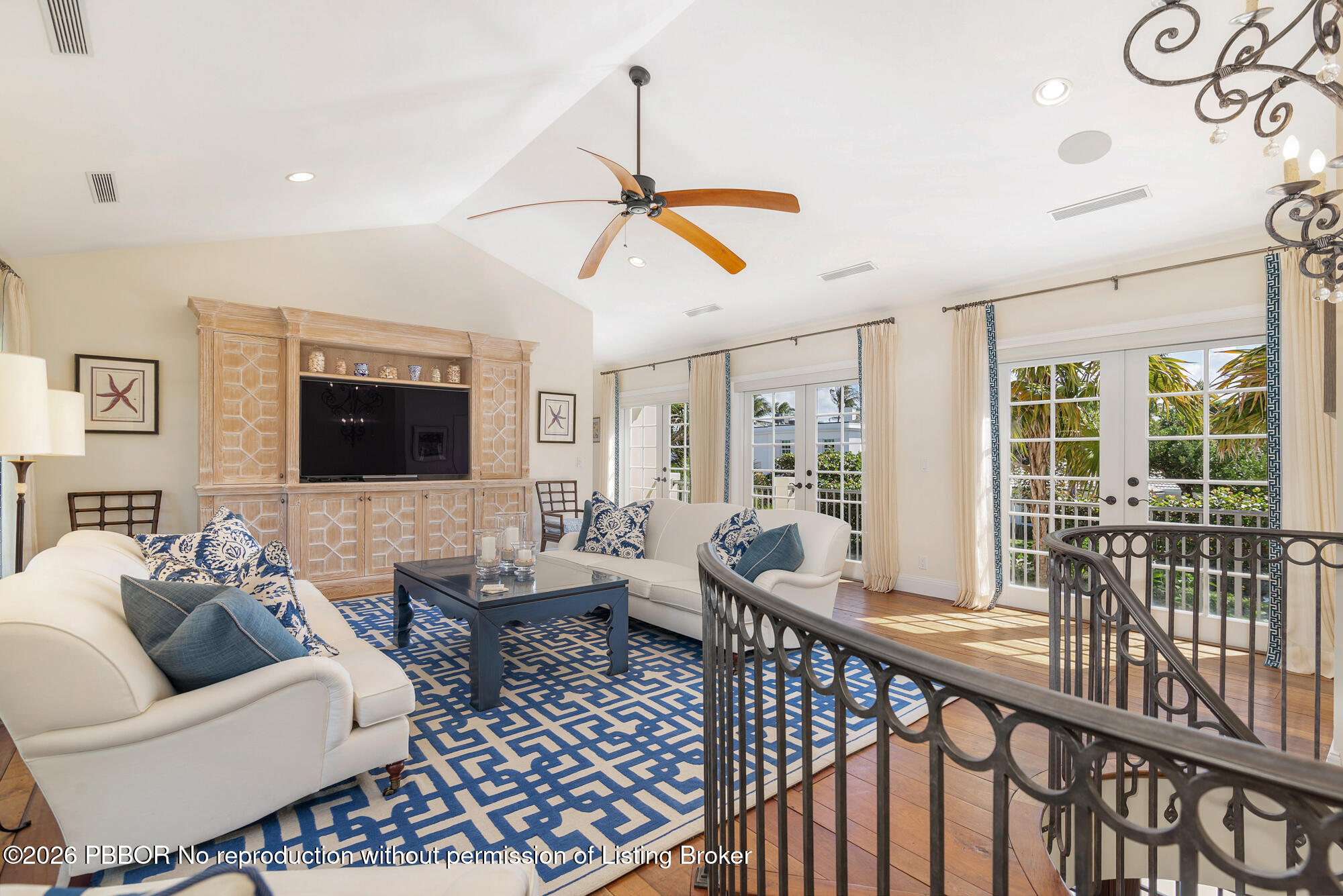 111 Seagate Road Palm Beach, FL 33480 - Photo 13 of 35 a living room with furniture and a flat screen tv