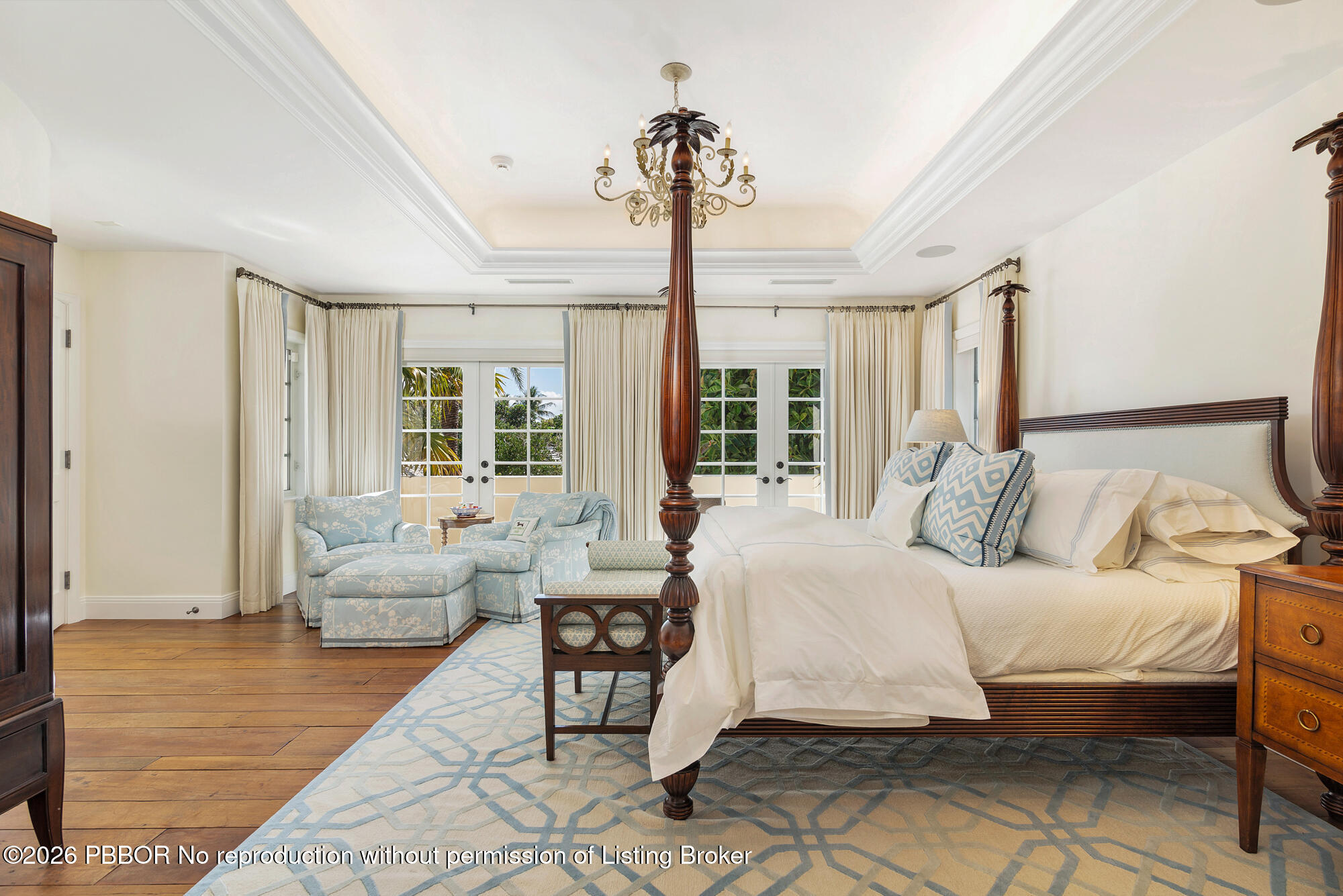 111 Seagate Road Palm Beach, FL 33480 - Photo 16 of 35 a bedroom with a bed and glass walk in closet