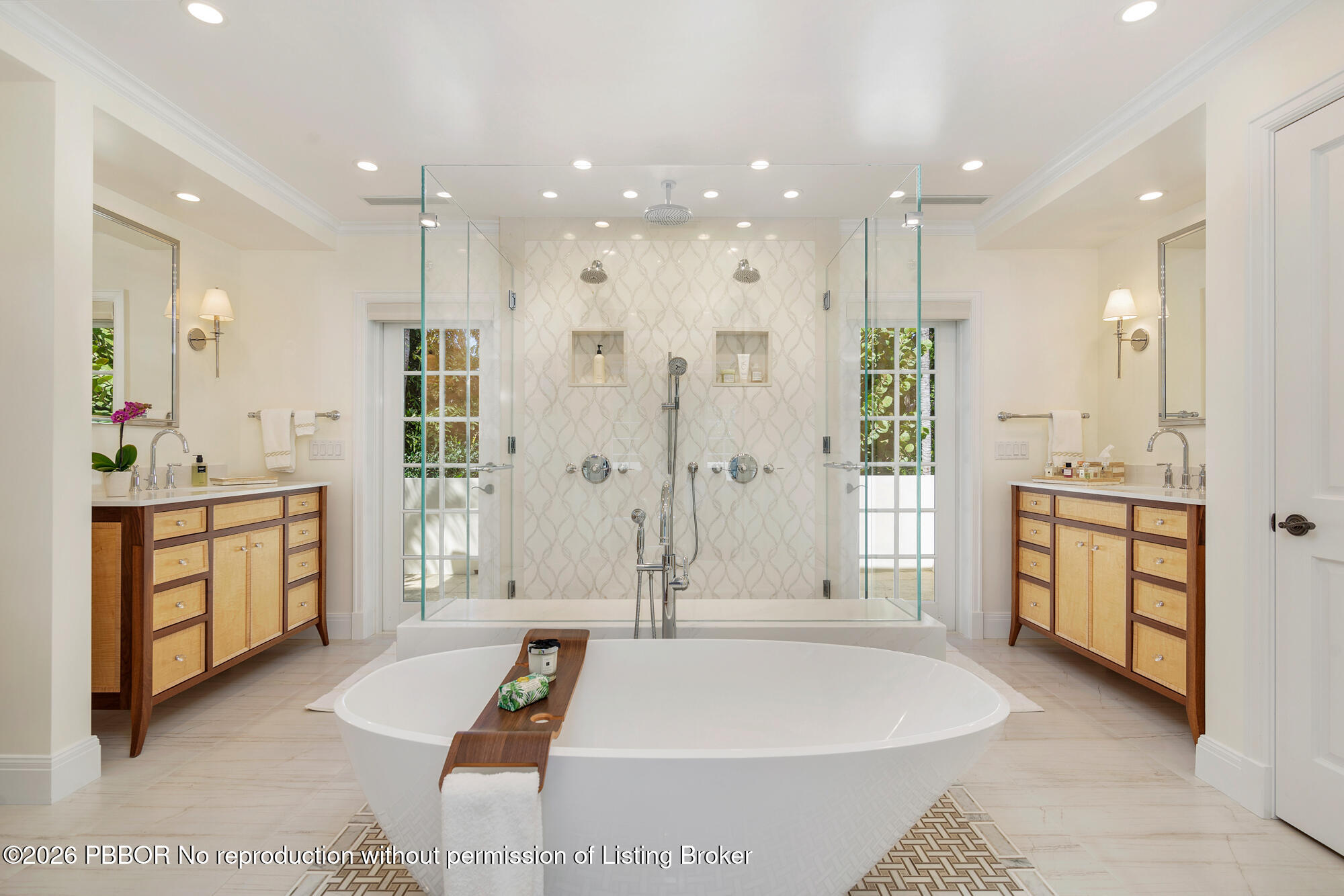 111 Seagate Road Palm Beach, FL 33480 - Photo 17 of 35 a bathroom with a tub a sink shower and mirror