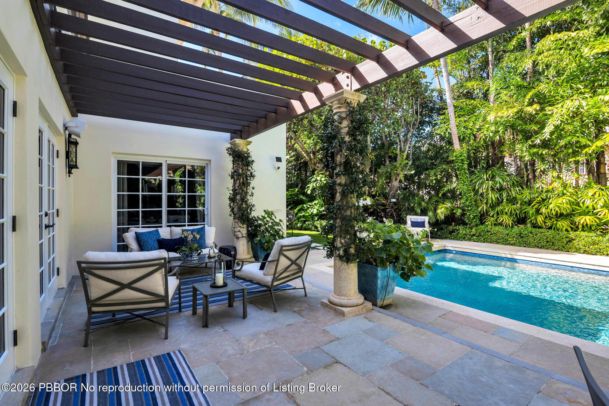 111 Seagate Road Palm Beach, FL 33480 - Photo 27 of 35 a house view with a sitting space and garden