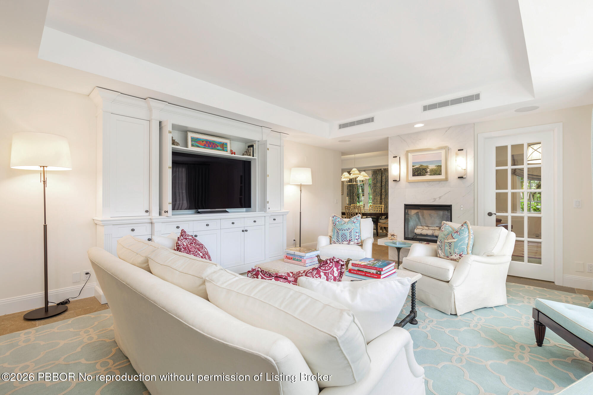 111 Seagate Road Palm Beach, FL 33480 - Photo 7 of 35 a living room with furniture fireplace and flat screen tv