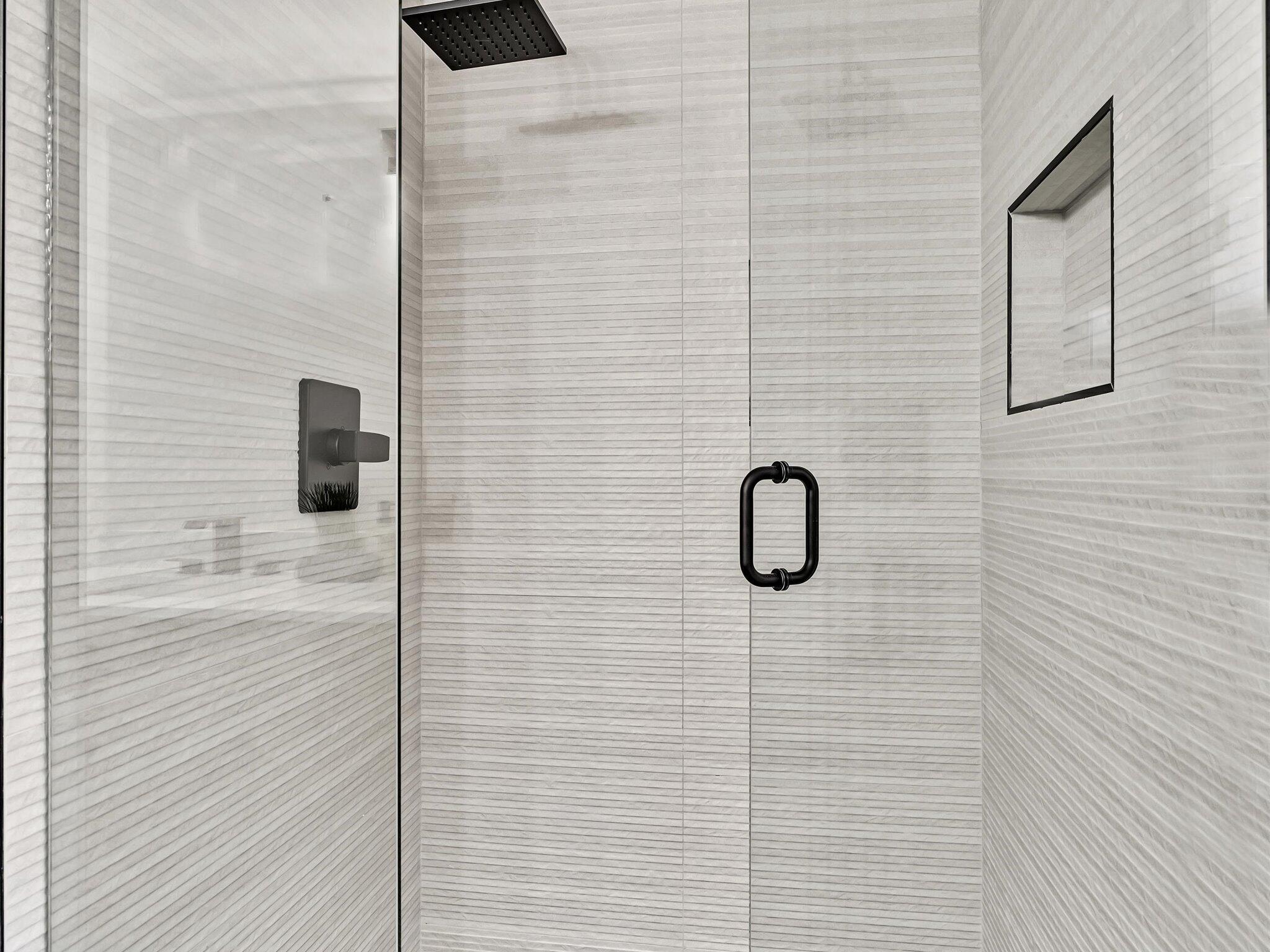 21 Royal Palm Way, Unit 303 Boca Raton, FL 33432 - Photo 22 of 38 a bathroom with a shower