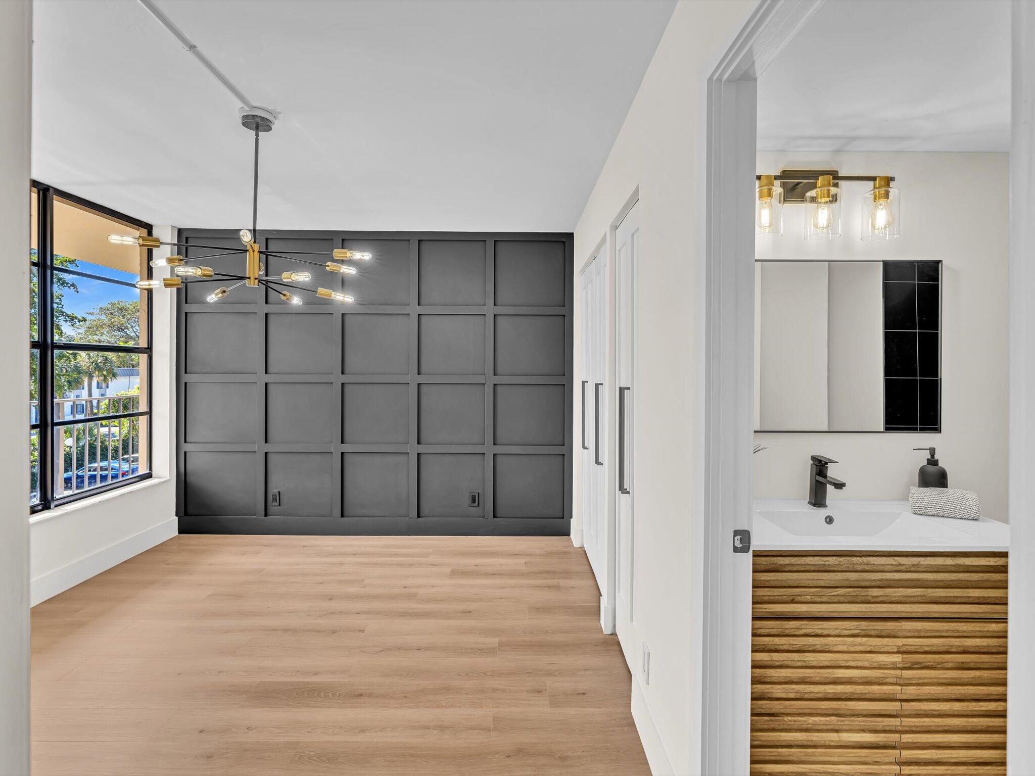 21 Royal Palm Way, Unit 303 Boca Raton, FL 33432 - Photo 26 of 38 a view of a bathroom with a sink