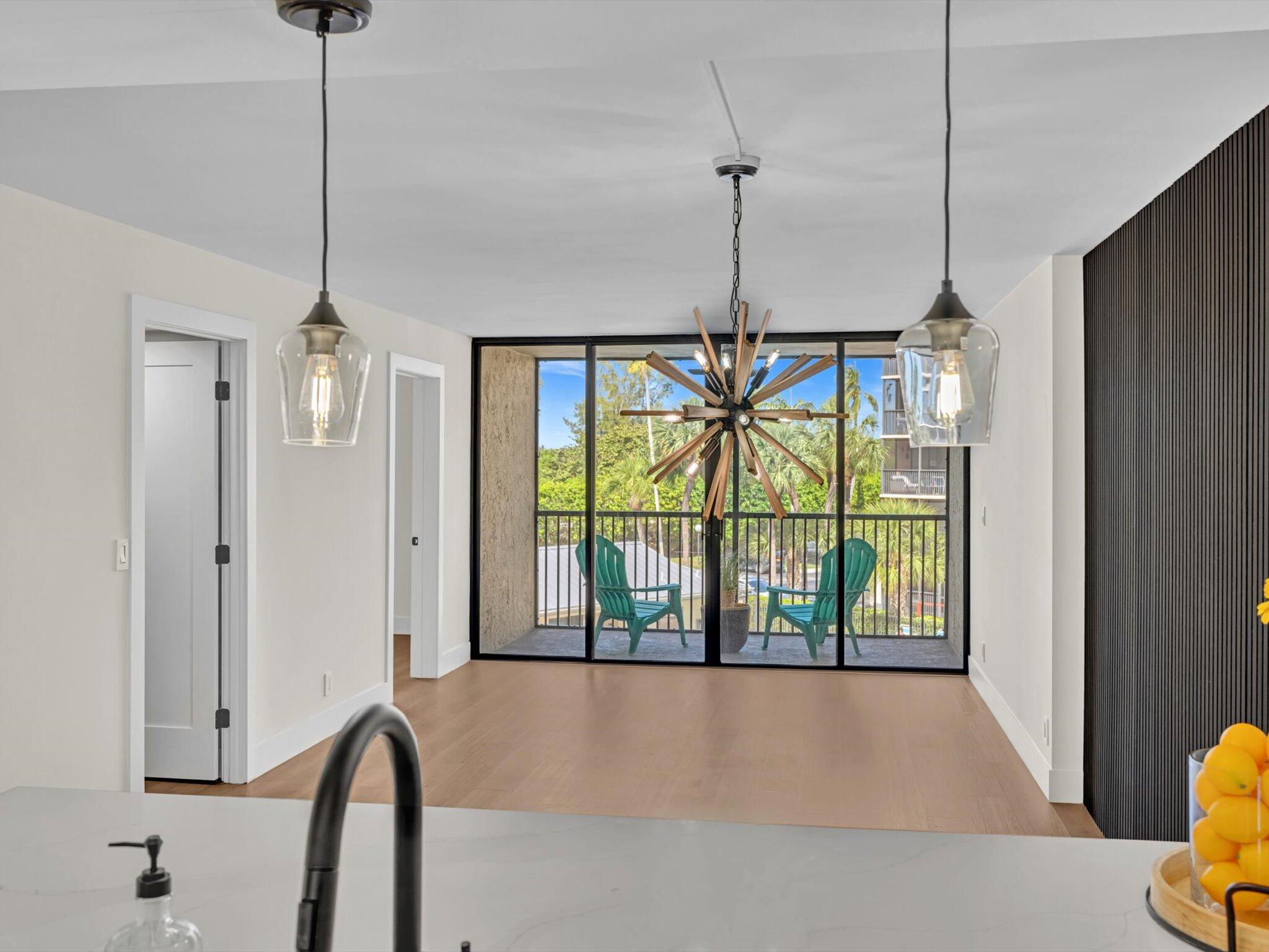 21 Royal Palm Way, Unit 303 Boca Raton, FL 33432 - Photo 9 of 38 a view of empty room with windows and air conditioner
