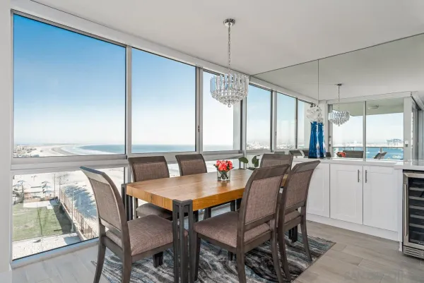 a dining room with furniture and window