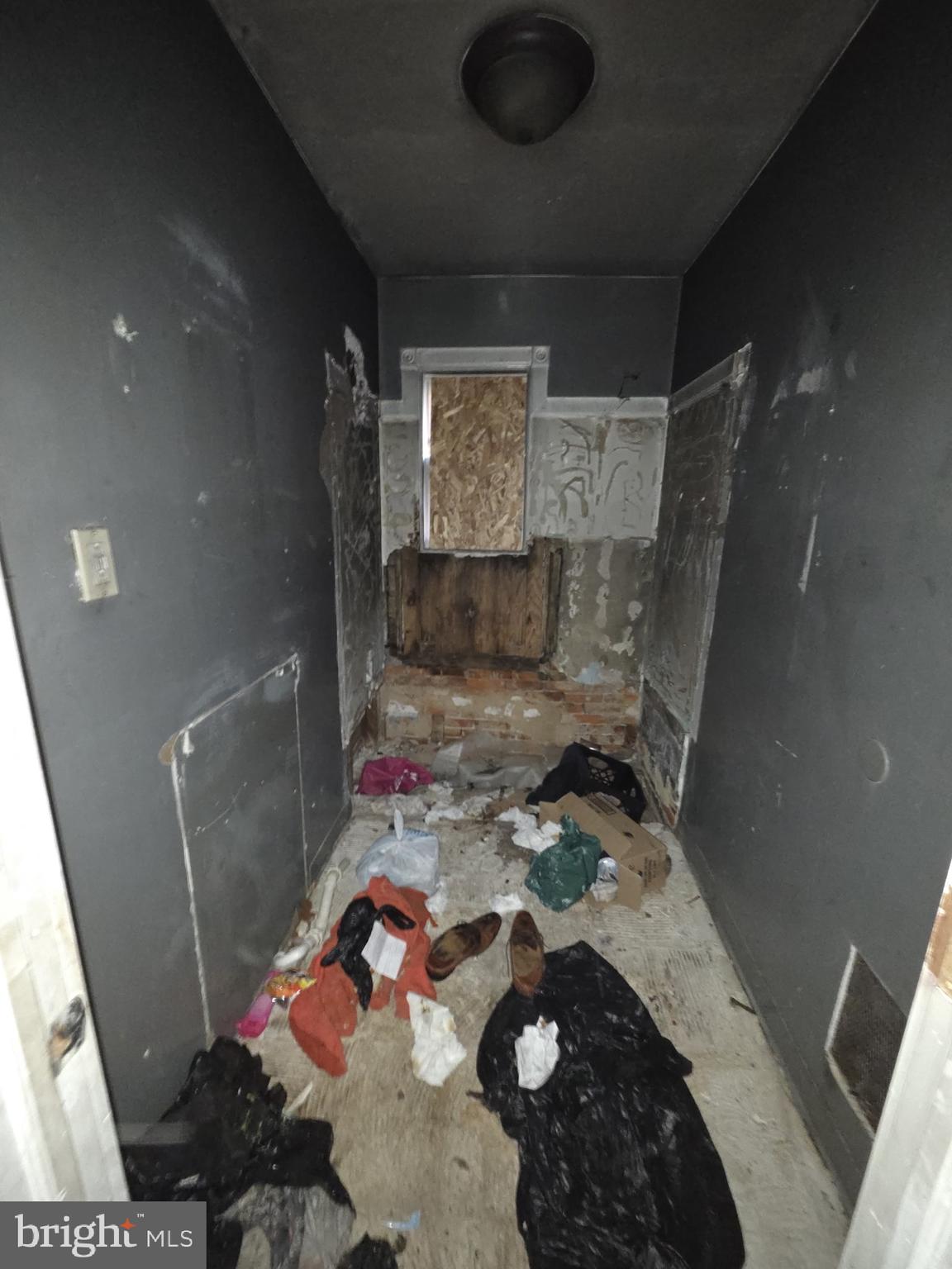 610 West 8th Street Chester, PA 19013 - Photo 12 of 15 a living room with furniture and a rug