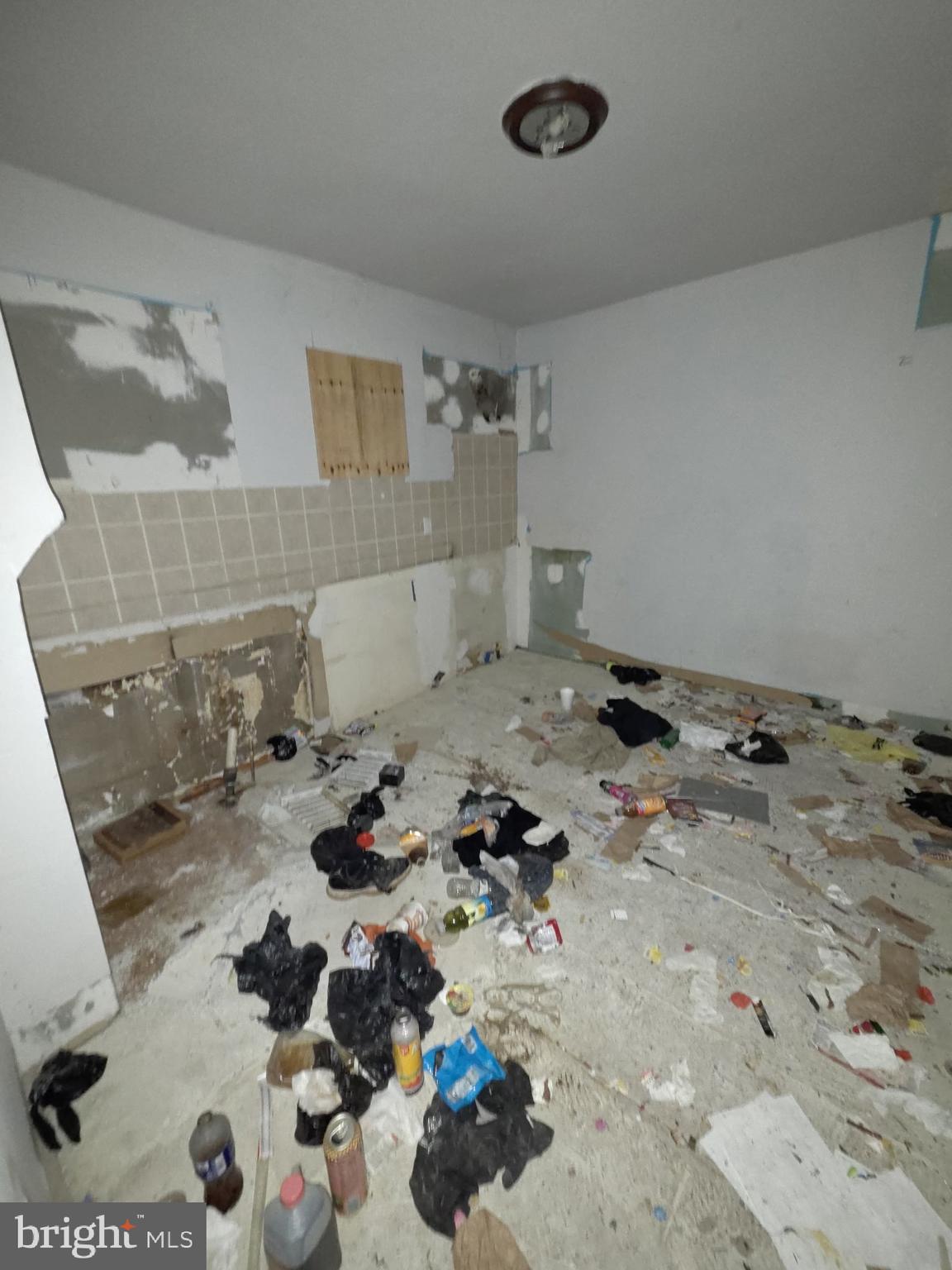 610 West 8th Street Chester, PA 19013 - Photo 15 of 15 a bathroom with a sink and a mirror