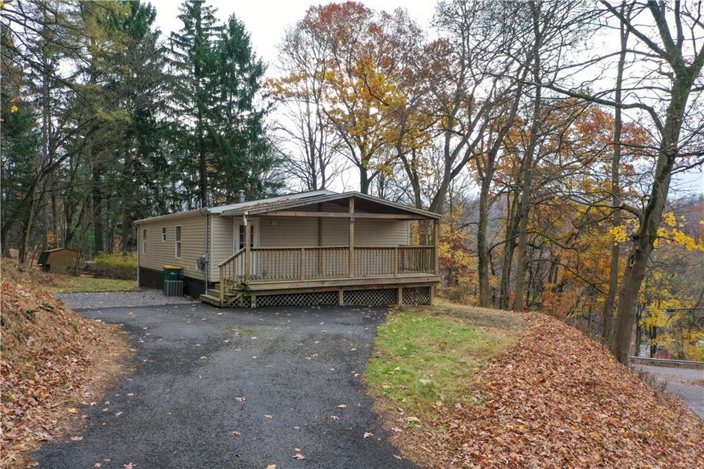 3454 Evergreen Road Pittsburgh, PA 15237 - Photo 2 of 25 a house with trees in the back