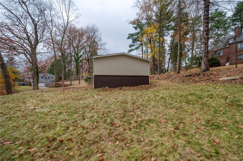 3454 Evergreen Road Pittsburgh, PA 15237 - Photo 25 of 25 a house that has a tree in front of it