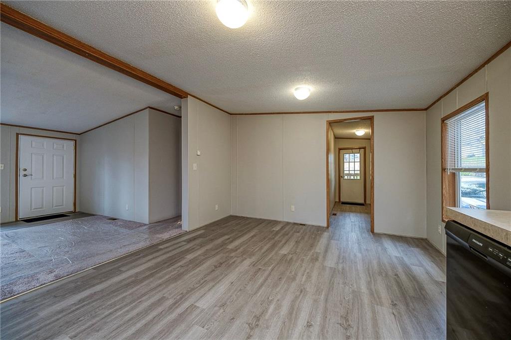 3454 Evergreen Road Pittsburgh, PA 15237 - Photo 8 of 25 an empty room with wooden floor and windows