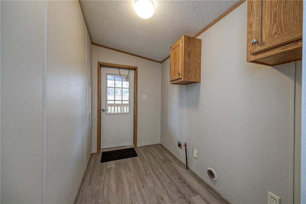 3454 Evergreen Road Pittsburgh, PA 15237 - Photo 9 of 25 a view of a room with wooden floor and cabinet