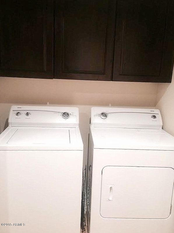 3935 East Rough Rider Road, Unit 1170 Phoenix, AZ 85050 - Photo 21 of 27 Laundry Room