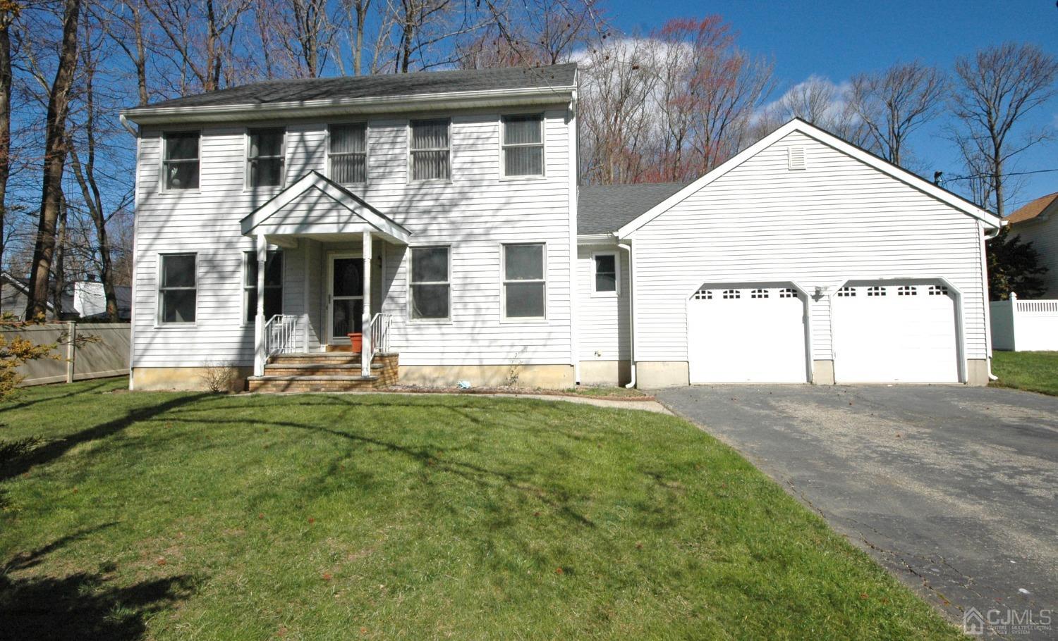 9 Doyle Road Old Bridge, NJ 07747 - Photo 1 of 1 a front view of a house with a yard