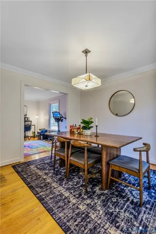 a view of a dining room and a table
