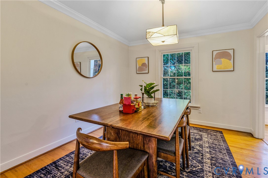 2331 Hicks Road North Chesterfield, VA 23235 - Photo 9 of 19 a view of a dining room with furniture and a window