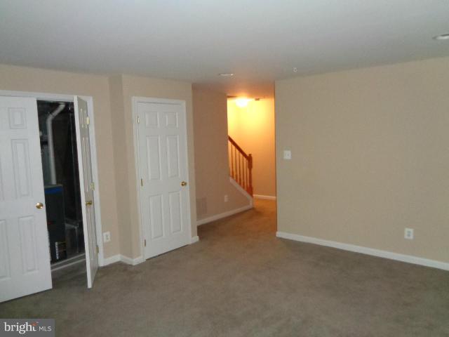 1736 Waltman Road Edgewood, MD 21040 - Photo 18 of 21 an empty room with a window and a bathroom