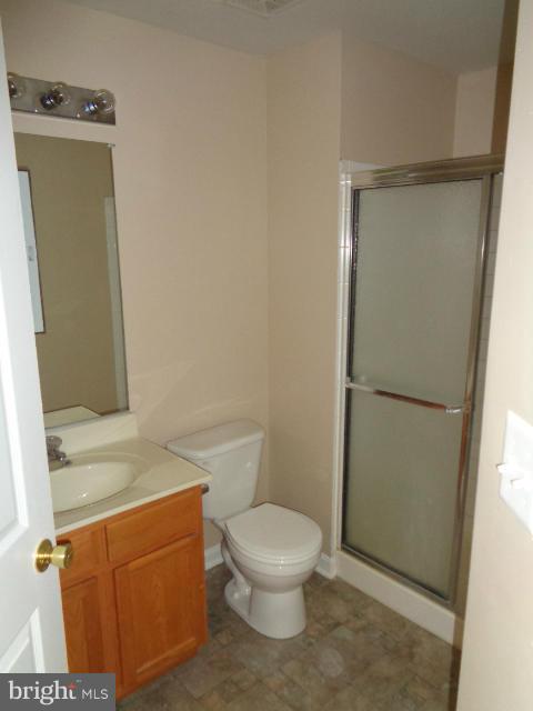 1736 Waltman Road Edgewood, MD 21040 - Photo 20 of 21 a white toilet sitting next to a bathroom sink