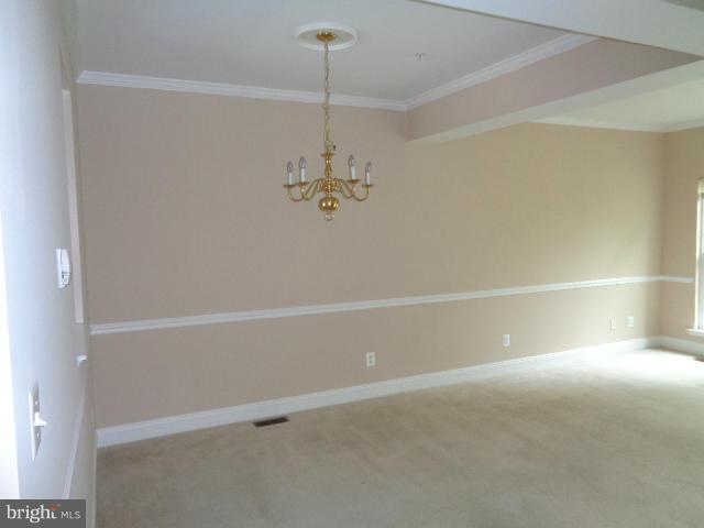 1736 Waltman Road Edgewood, MD 21040 - Photo 6 of 21 a view of an empty room with a fan