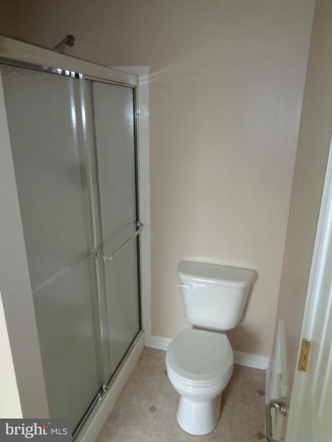 1736 Waltman Road Edgewood, MD 21040 - Photo 10 of 21 a bathroom with a toilet and a shower