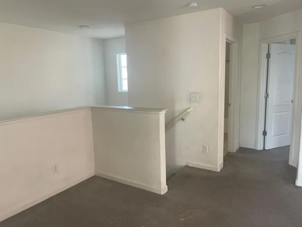 an empty room with an entryway