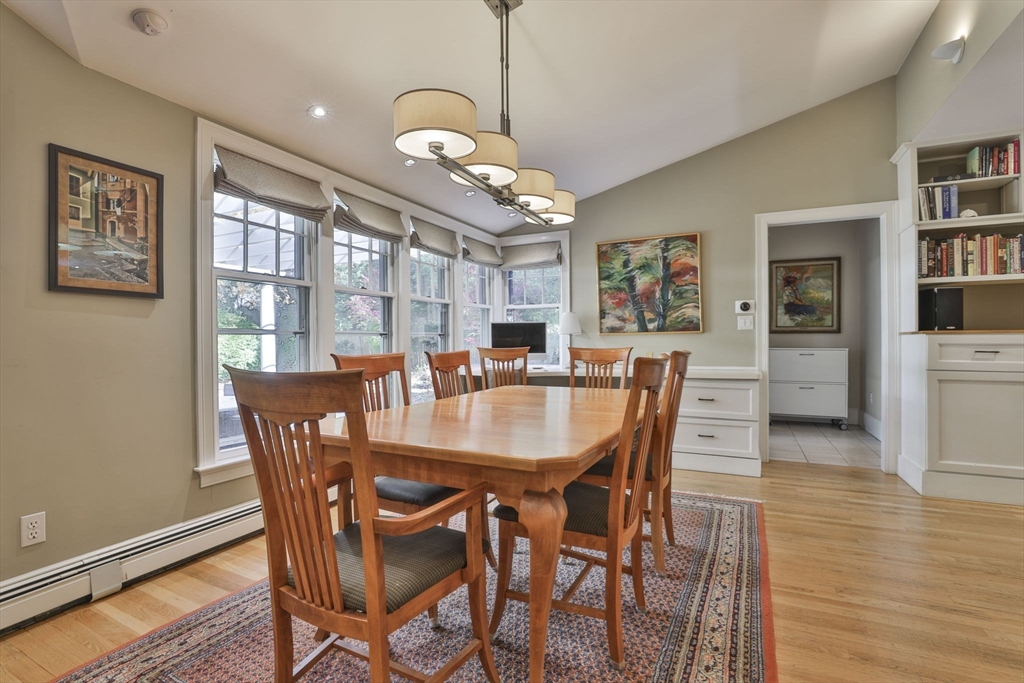 32 Columbine Road Milton, MA 02186 - Photo 11 of 40 a view of a dining room with furniture window and wooden floor