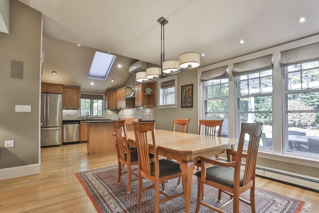 32 Columbine Road Milton, MA 02186 - Photo 12 of 40 a view of a dining room with furniture window and wooden floor