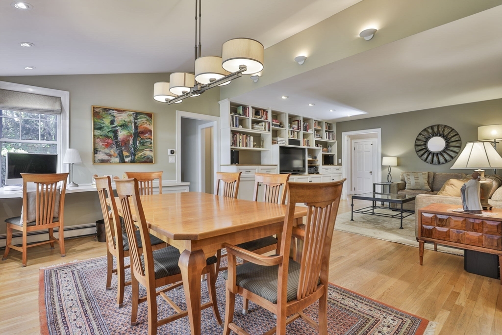 32 Columbine Road Milton, MA 02186 - Photo 13 of 40 a view of a dining room with furniture and wooden floor