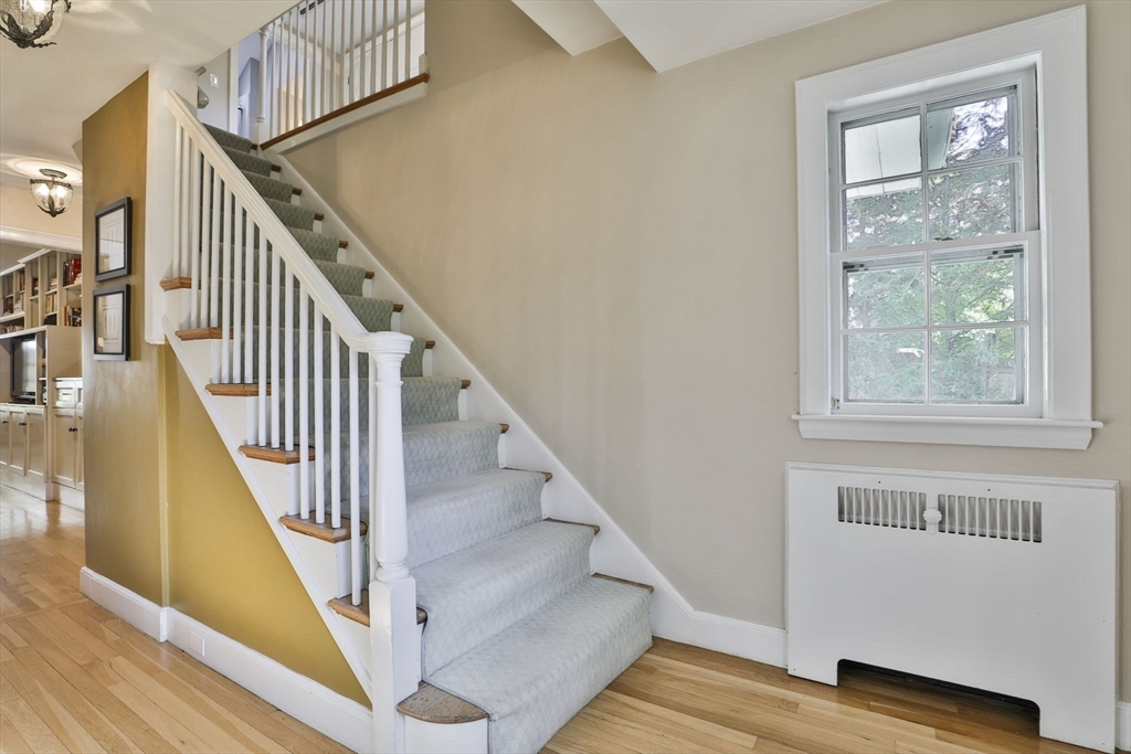 32 Columbine Road Milton, MA 02186 - Photo 20 of 40 a view of entryway and hall with wooden floor