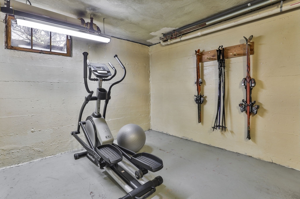 32 Columbine Road Milton, MA 02186 - Photo 35 of 40 a view of a room with gym equipment