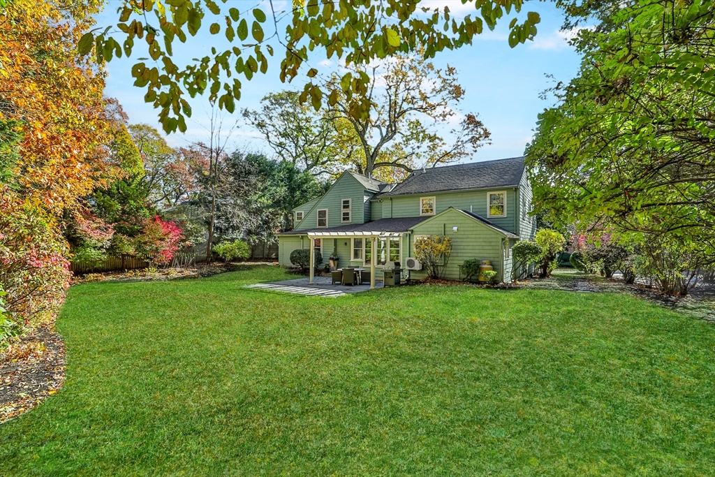 32 Columbine Road Milton, MA 02186 - Photo 36 of 40 a view of an house with backyard and garden