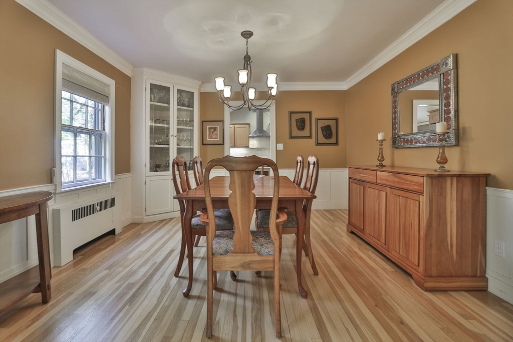 32 Columbine Road Milton, MA 02186 - Photo 6 of 40 a view of a dining room with furniture window and wooden floor