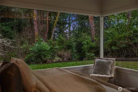 a view of a back yard from a balcony