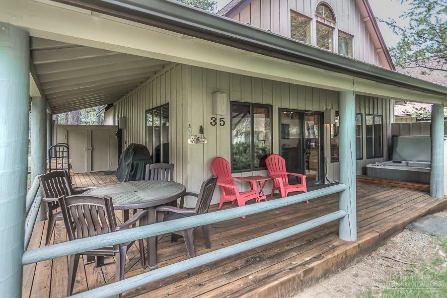 A laid-back wrap around porch overlooks