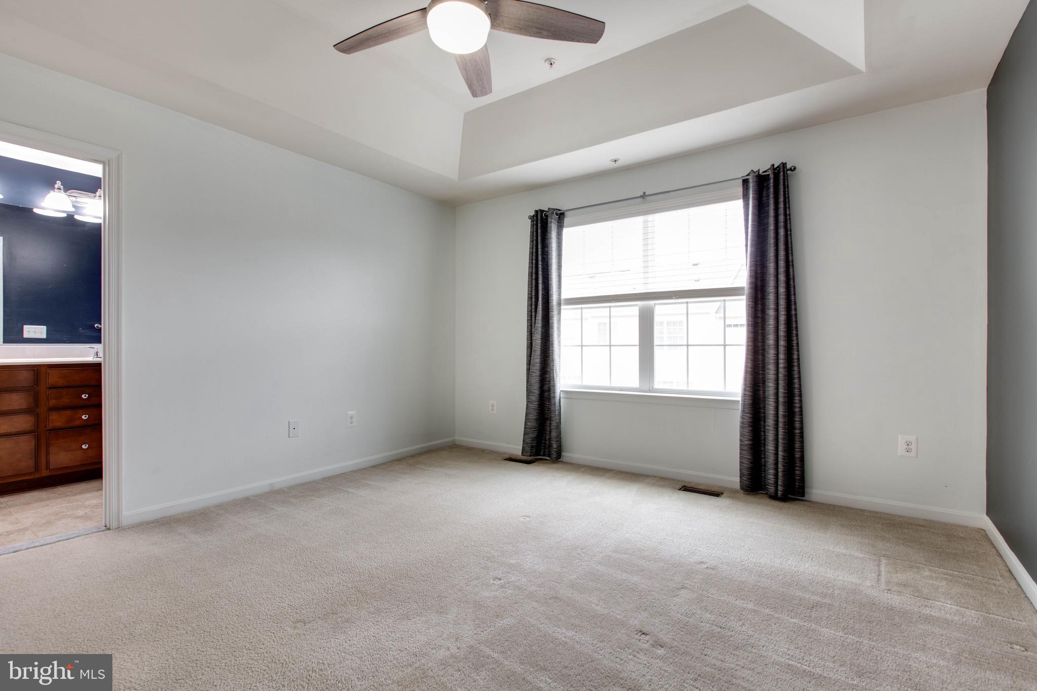 7926 Silver Oak Road Hanover, MD 21076 - Photo 23 of 44 a view of an empty room with a window