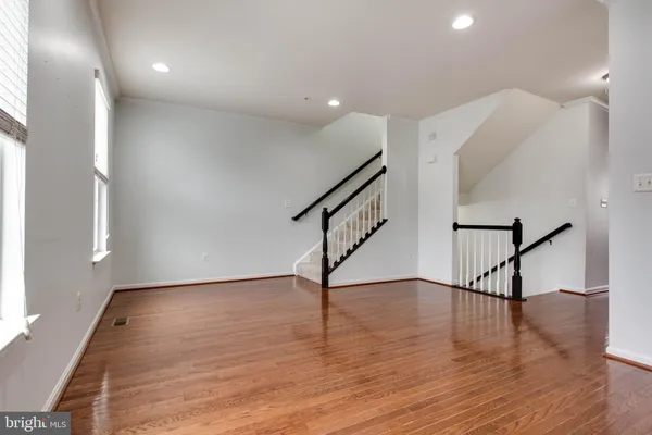a view of entryway with wooden floor