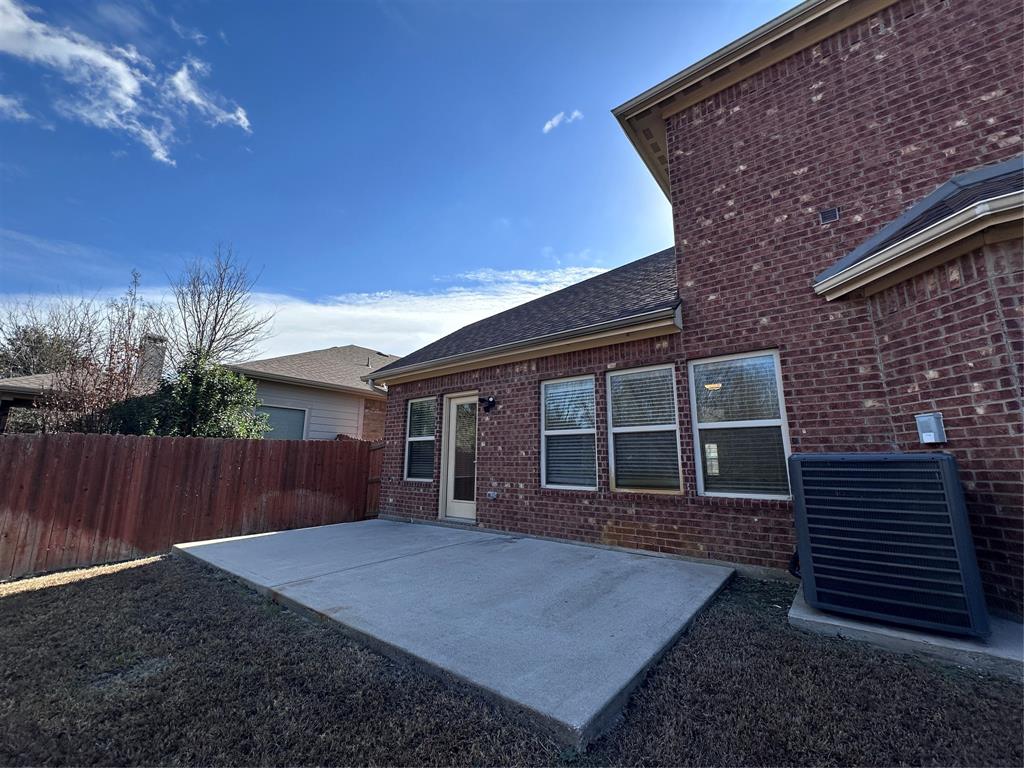 6549 Compass Ridge Drive Dallas, TX 75249 - Photo 17 of 19 a house view with a backyard space