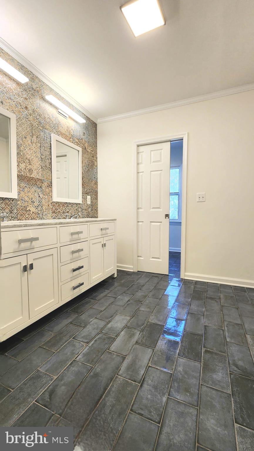 1447 Hampton Hill Circle McLean, VA 22101 - Photo 23 of 46 a view of a kitchen with white cabinets