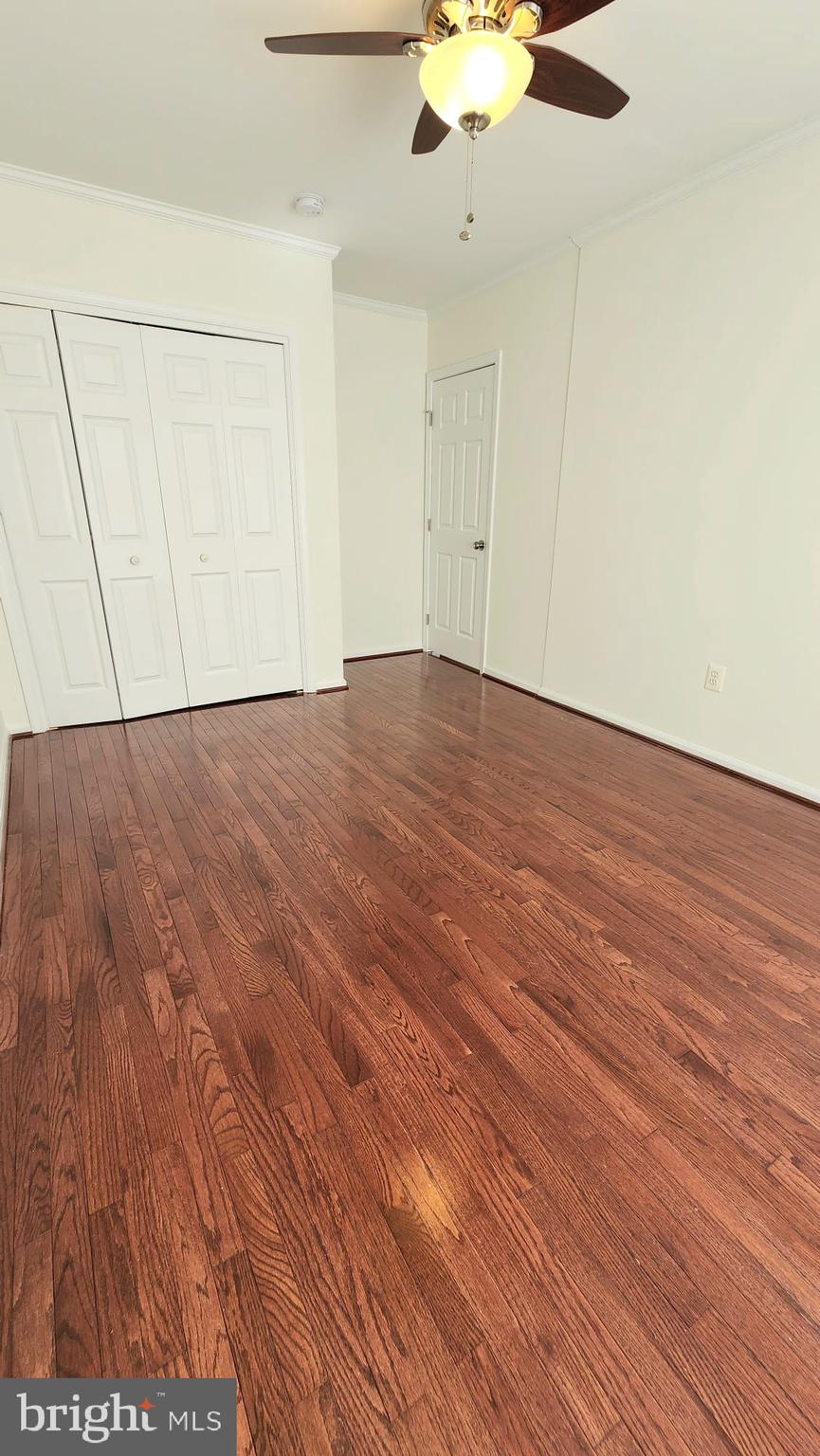 1447 Hampton Hill Circle McLean, VA 22101 - Photo 32 of 46 wooden floor in an empty room